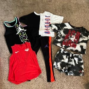 2 Jordan outfits & 1 jordan jersey & 1 Nike shirt